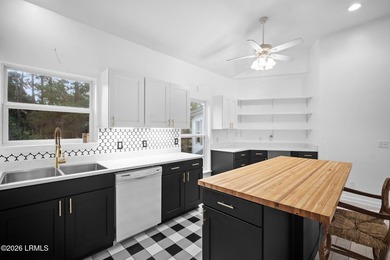 Enjoy sweeping marsh views and exceptional value in this - photo 11