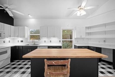Enjoy sweeping marsh views and exceptional value in this - photo 12