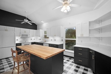 Enjoy sweeping marsh views and exceptional value in this - photo 14