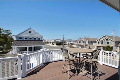 NEWLY RENOVATED!! -  This Custom built four bedroom, three and - photo 9