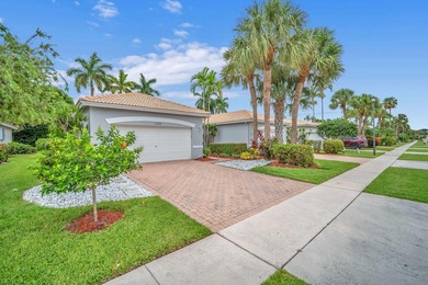 Welcome home to this beautifully updated villa in the highly - photo 2