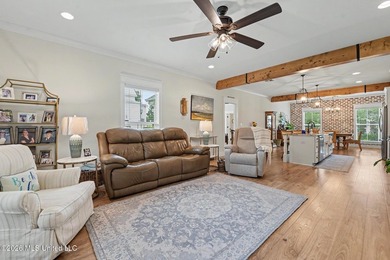 Nestled amongst majestic Live Oaks on one of Waveland's most - photo 4