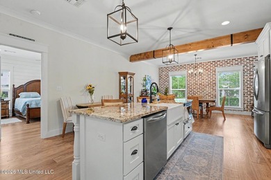 Nestled amongst majestic Live Oaks on one of Waveland's most - photo 7