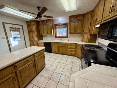 Don't let this homes exterior fool you - this home has over 6