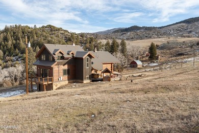 Elk Meadows Ranch is a 198-acre recreational and agricultural - photo 1