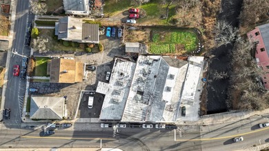Assemblage directly across from the Mamaroneck Metro-North Train - photo 1