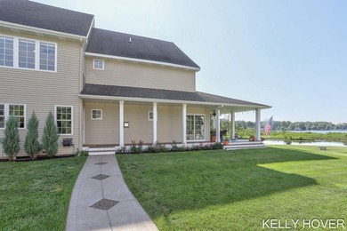 Experience the **Gun Lake lifestyle** in this beautifully - photo 40