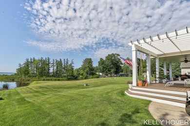 Experience the **Gun Lake lifestyle** in this beautifully - photo 50