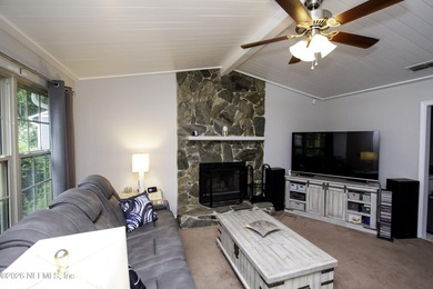 Full of warmth and character, this beautifully maintained - photo 3