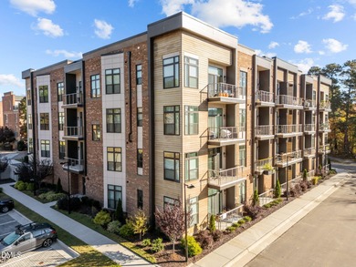 Lakeside living. First level condo conveniently situated on NCSU