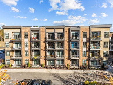 Lakeside living. First level condo conveniently situated on NCSU