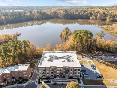 Lakeside living. First level condo conveniently situated on NCSU