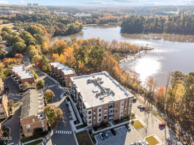 Lakeside living. First level condo conveniently situated on NCSU