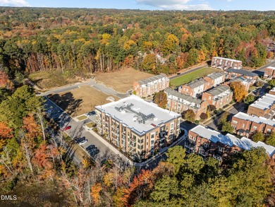 Lakeside living. First level condo conveniently situated on NCSU