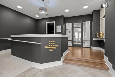 Lakeside living. First level condo conveniently situated on NCSU