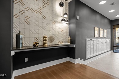 Lakeside living. First level condo conveniently situated on NCSU