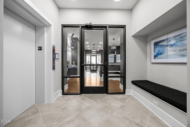 Lakeside living. First level condo conveniently situated on NCSU