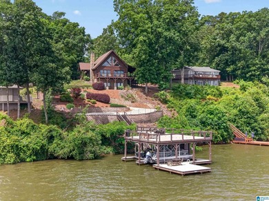 Experience refined lakefront living in this exceptional log - photo 1