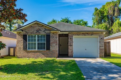 Welcome to this charming 4-bedroom, 2-bathroom home offering - photo 1