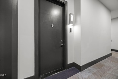 Lakeside living. First level condo conveniently situated on NCSU