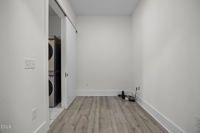 Lakeside living. First level condo conveniently situated on NCSU