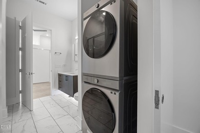 Lakeside living. First level condo conveniently situated on NCSU