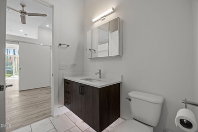 Lakeside living. First level condo conveniently situated on NCSU