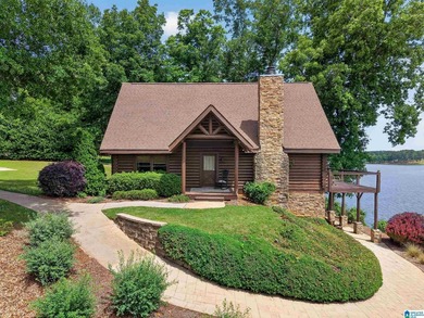 Experience refined lakefront living in this exceptional log - photo 8