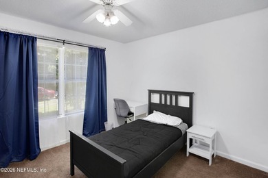 Welcome to this charming 4-bedroom, 2-bathroom home offering - photo 8