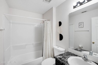 Welcome to this charming 4-bedroom, 2-bathroom home offering - photo 10