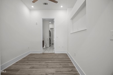 Lakeside living. First level condo conveniently situated on NCSU