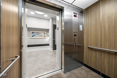 Lakeside living. First level condo conveniently situated on NCSU