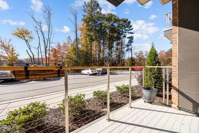 Lakeside living. First level condo conveniently situated on NCSU