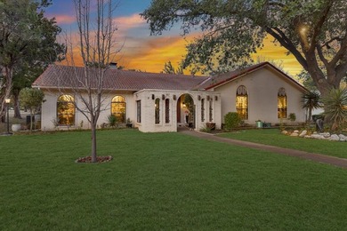 Beautiful modern hacienda-style home backing to a lush greenbelt