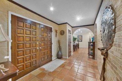 Beautiful modern hacienda-style home backing to a lush greenbelt