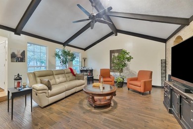 Beautiful modern hacienda-style home backing to a lush greenbelt