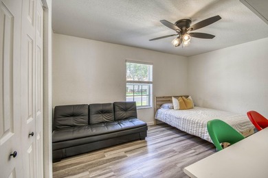 Beautifully updated 4-bedroom, 2-bath home featuring a brand-new - photo 21