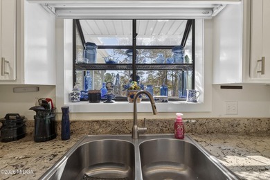 Beautiful all-brick home on the 2nd fairway! This 3-bedroom - photo 40