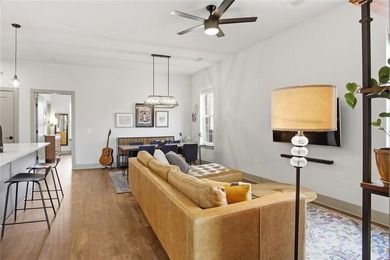 Bright, open double corner unit located just one block from the