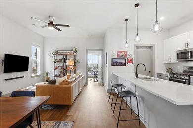 Bright, open double corner unit located just one block from the