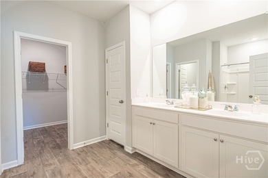 This single-story Hartford home design features an open space - photo 12