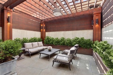 This exceptional over 20-foot-wide townhouse is discreetly - photo 13