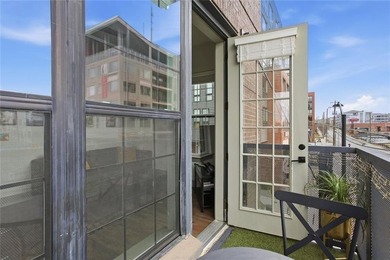 Bright, open double corner unit located just one block from the