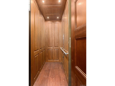 This exceptional over 20-foot-wide townhouse is discreetly - photo 15