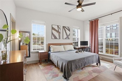 Bright, open double corner unit located just one block from the