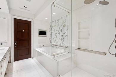 This exceptional over 20-foot-wide townhouse is discreetly - photo 22