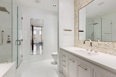 This exceptional over 20-foot-wide townhouse is discreetly - photo 29