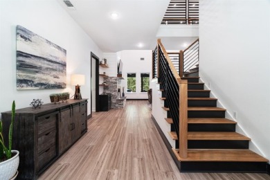 Discover this custom built modern farmhouse set on 4.65 acres