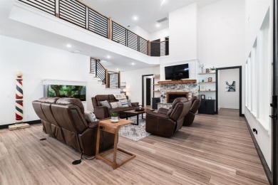 Discover this custom built modern farmhouse set on 4.65 acres