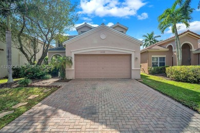 Nestled within the gated community of Savanna, this expansive - photo 1
